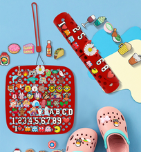 Load image into Gallery viewer, Shoe Decoration Charm Organizer Shoe Charm Portable Roll Storage Bag Wall Mounted Hanging Silicone Display Stand Not Contain Shoe Charm